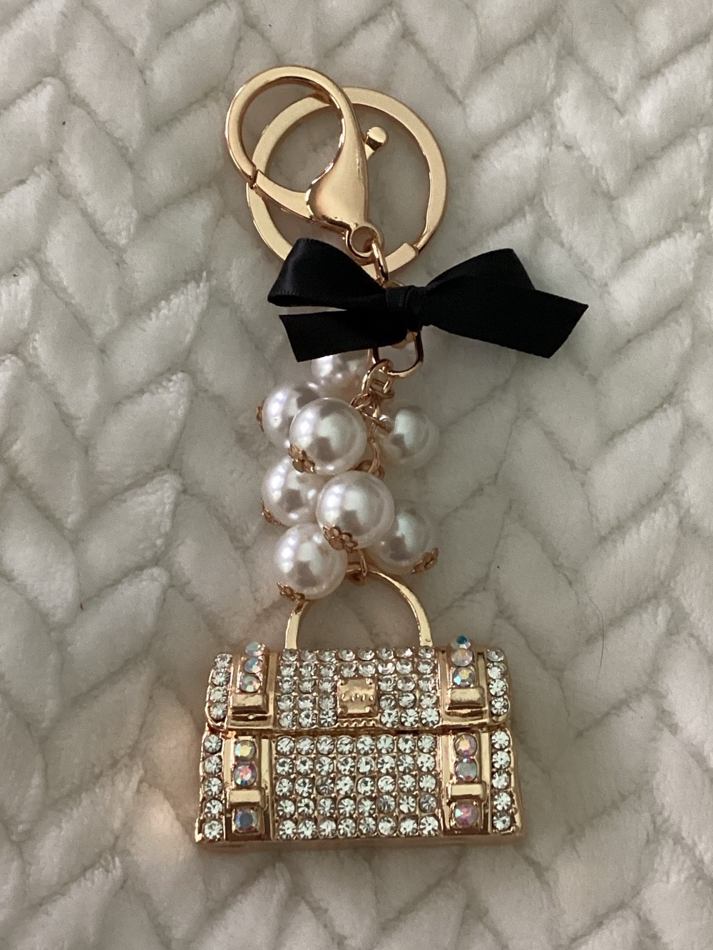 Crystal-Embellished Gold Handbag Keychain with Pearls and Black Bow - Picture 1 of 2